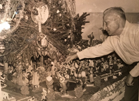 Joseph Notarianni with his annual Christmas Village display.